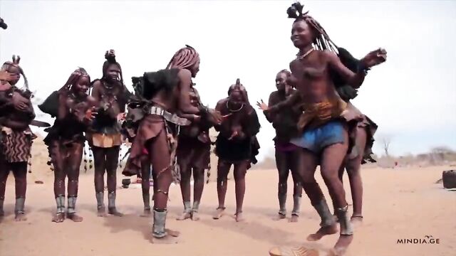 African Himba women dance and swing their saggy tits around