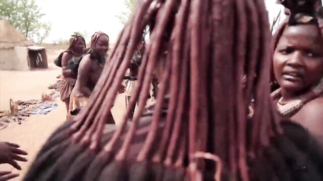 African Himba women dance and swing their saggy tits around