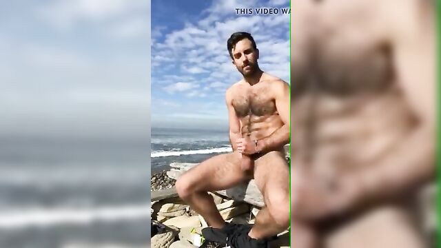 super hot hairy man jerks of on the beach