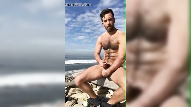 super hot hairy man jerks of on the beach