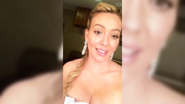 HIlary Duff cleavage in a fancy dress, selfie