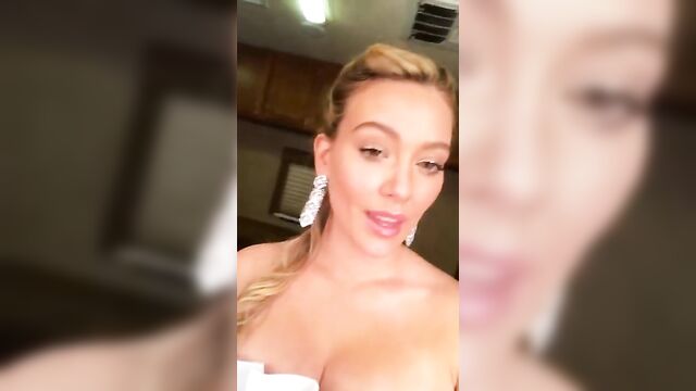 HIlary Duff cleavage in a fancy dress, selfie