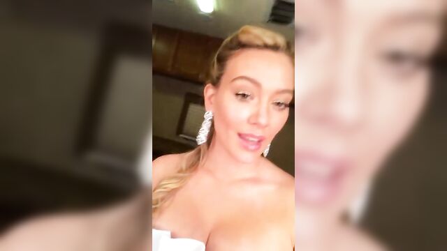 HIlary Duff cleavage in a fancy dress, selfie