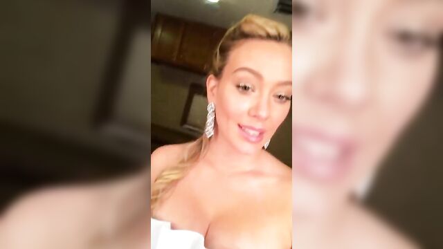 HIlary Duff cleavage in a fancy dress, selfie