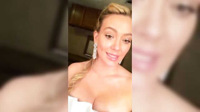 HIlary Duff cleavage in a fancy dress, selfie