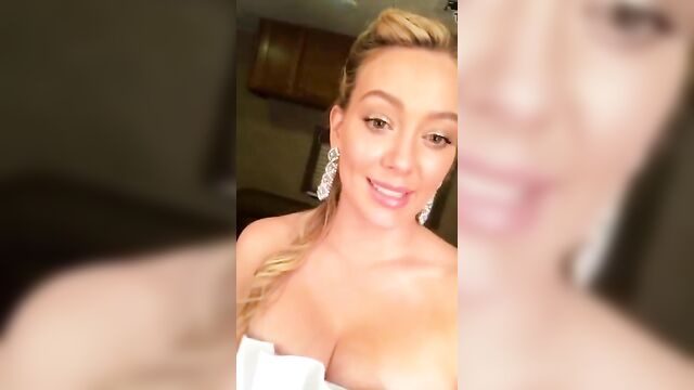 HIlary Duff cleavage in a fancy dress, selfie