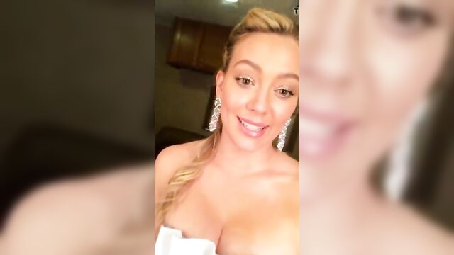 HIlary Duff cleavage in a fancy dress, selfie