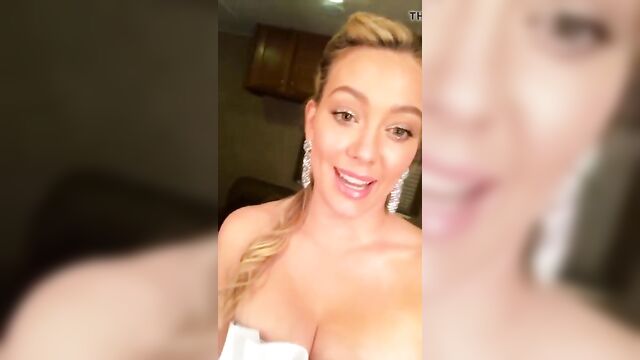 HIlary Duff cleavage in a fancy dress, selfie