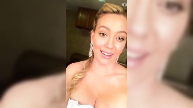 HIlary Duff cleavage in a fancy dress, selfie