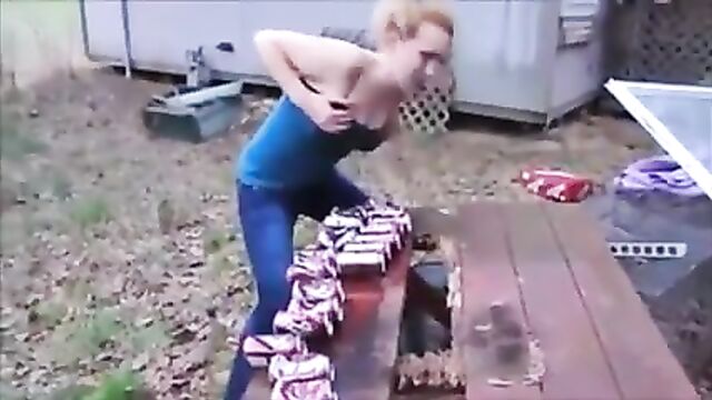 Girl Tries To Smash Cans With Her Breast And Fails