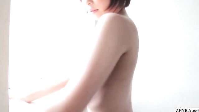 Mana Sakura beautiful Japanese posing naked by window