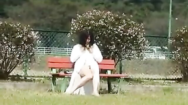 Asian MILF in public playground