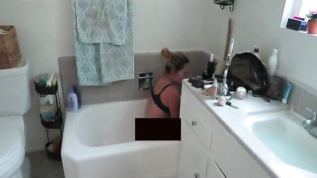 Nikki Baker in the bathtub