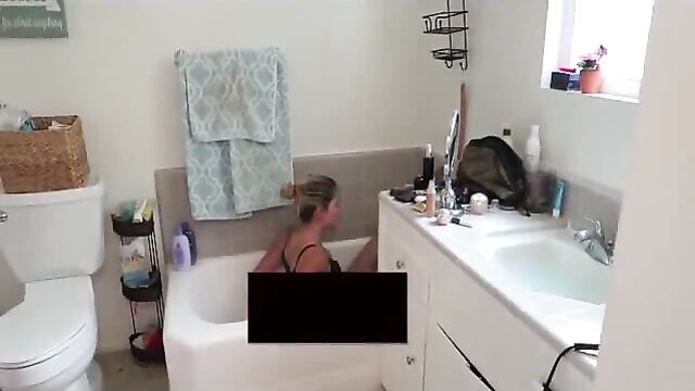 Nikki Baker in the bathtub