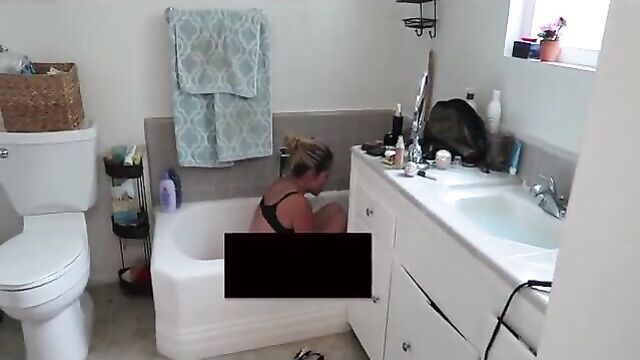 Nikki Baker in the bathtub