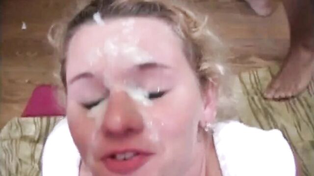 Young blonde covered in cum