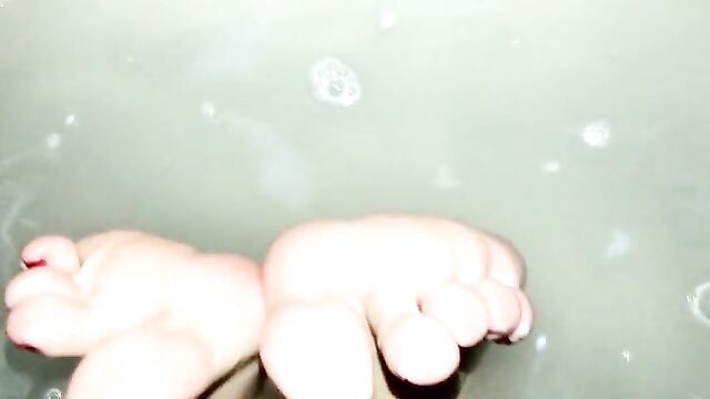Mistress Andrea Parker's feet take a bath