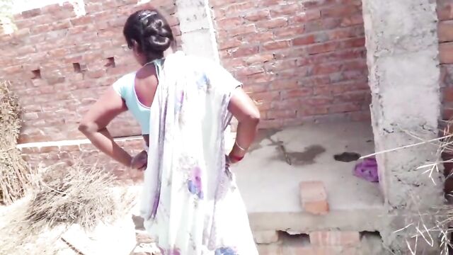 Beautiful Indian bhabhi pissing on her house roof and fingering her cremei tight pussy