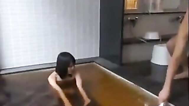 Foursome with an Asian girl in bath house
