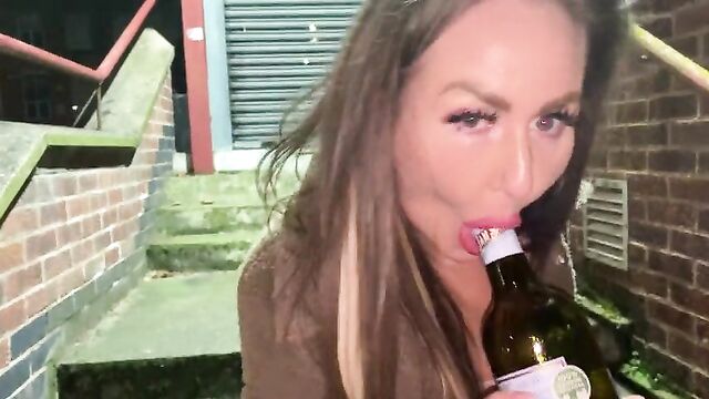 Being fucked with a bottle outdoors in public