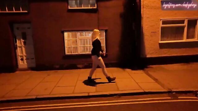 Young blonde wife walking nude down a high street in Suffolk