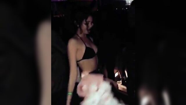 Sarah Hyland dancing at a concert