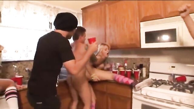 Sexy college girls start an orgy at a frat house party