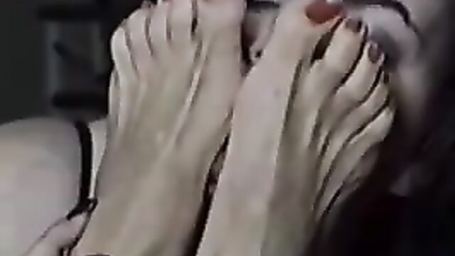 Girl worships old woman's wrinkled feet