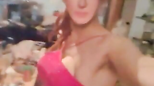 Crossdressing in a sexy red prom dress