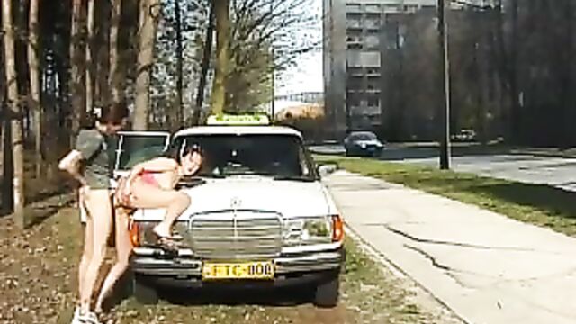 Nasty lady in full action outdoor at my taxi car