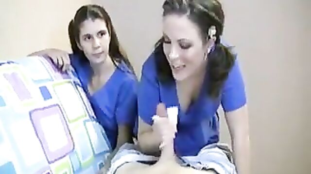 Two Nurses Milk Their Patient