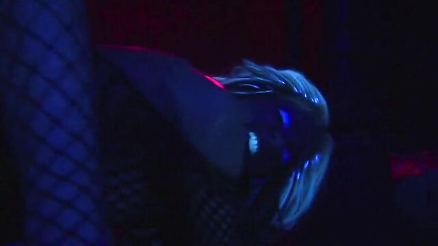 Horny lesbians fuck each other with a neon dildo in black light, crazy