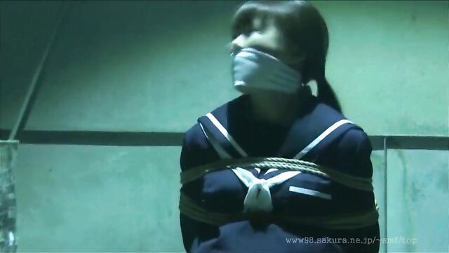 Japanese Schoolgirl tied and gagged in warehouse