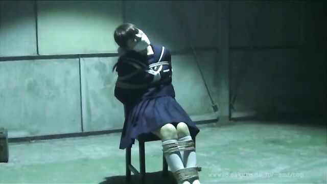 Japanese Schoolgirl tied and gagged in warehouse