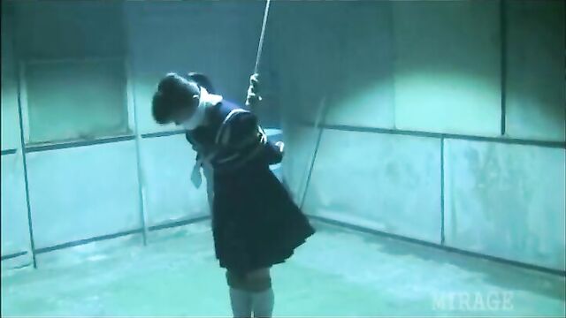 Japanese Schoolgirl tied and gagged in warehouse