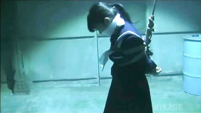 Japanese Schoolgirl tied and gagged in warehouse