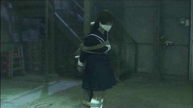 Japanese Schoolgirl tied and gagged in warehouse