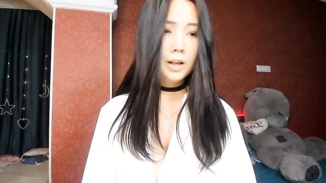 Busty Asian Siura puts hair pins on her nipples