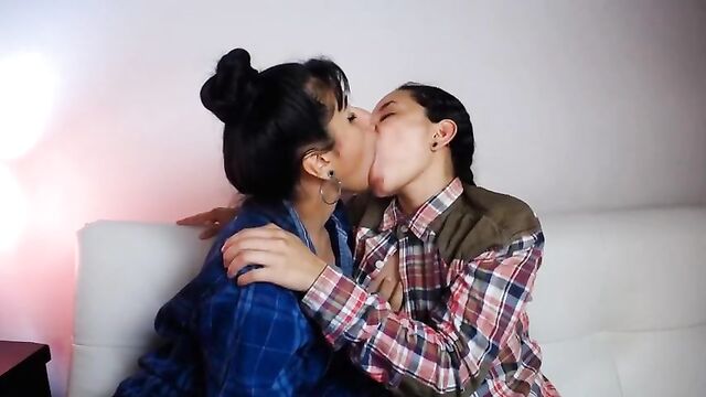 Latina lesbians Zoe and Lola play with each other’s tits